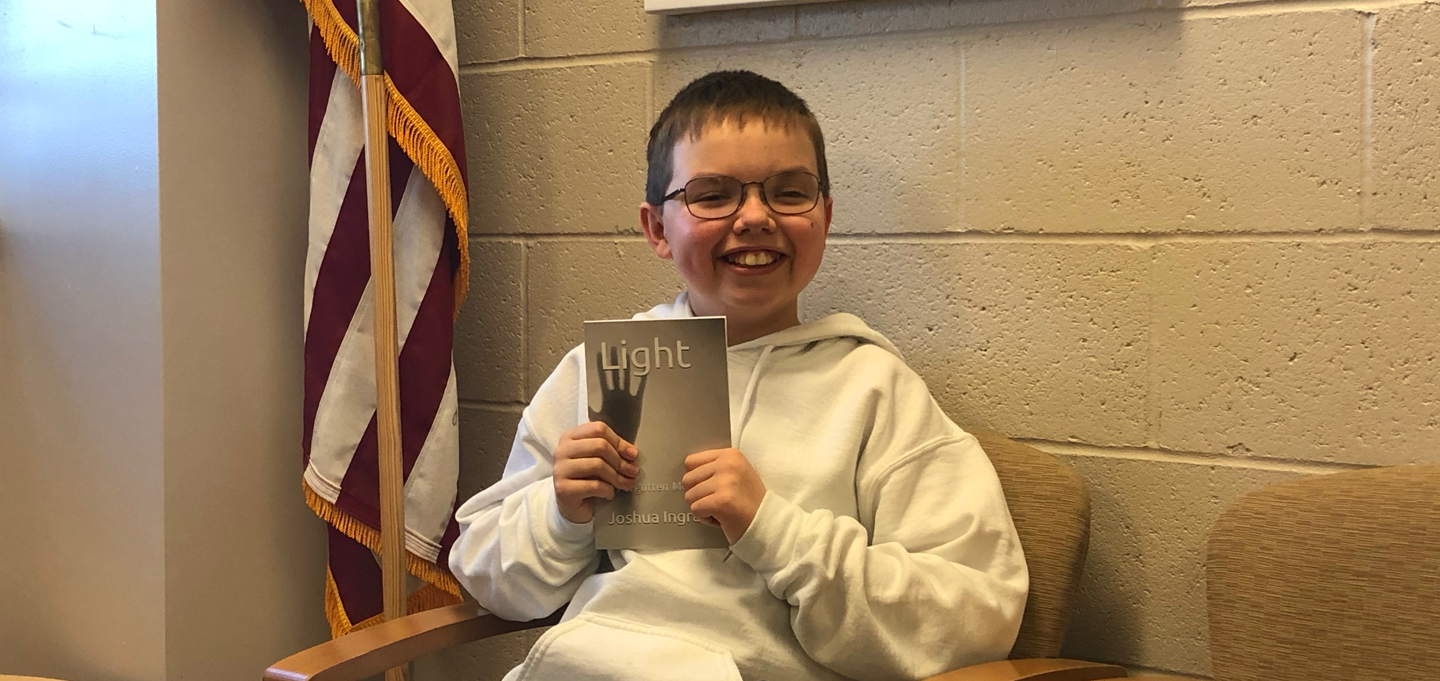 Josh Ingram put his pen to paper and wrote his first book, “Light – A Forgotten Monster,”  this past December. The dynamic sixth-grade student, humble at heart and kind in spirit, has captured us all, enticing us to order our copy while the press is hot. 